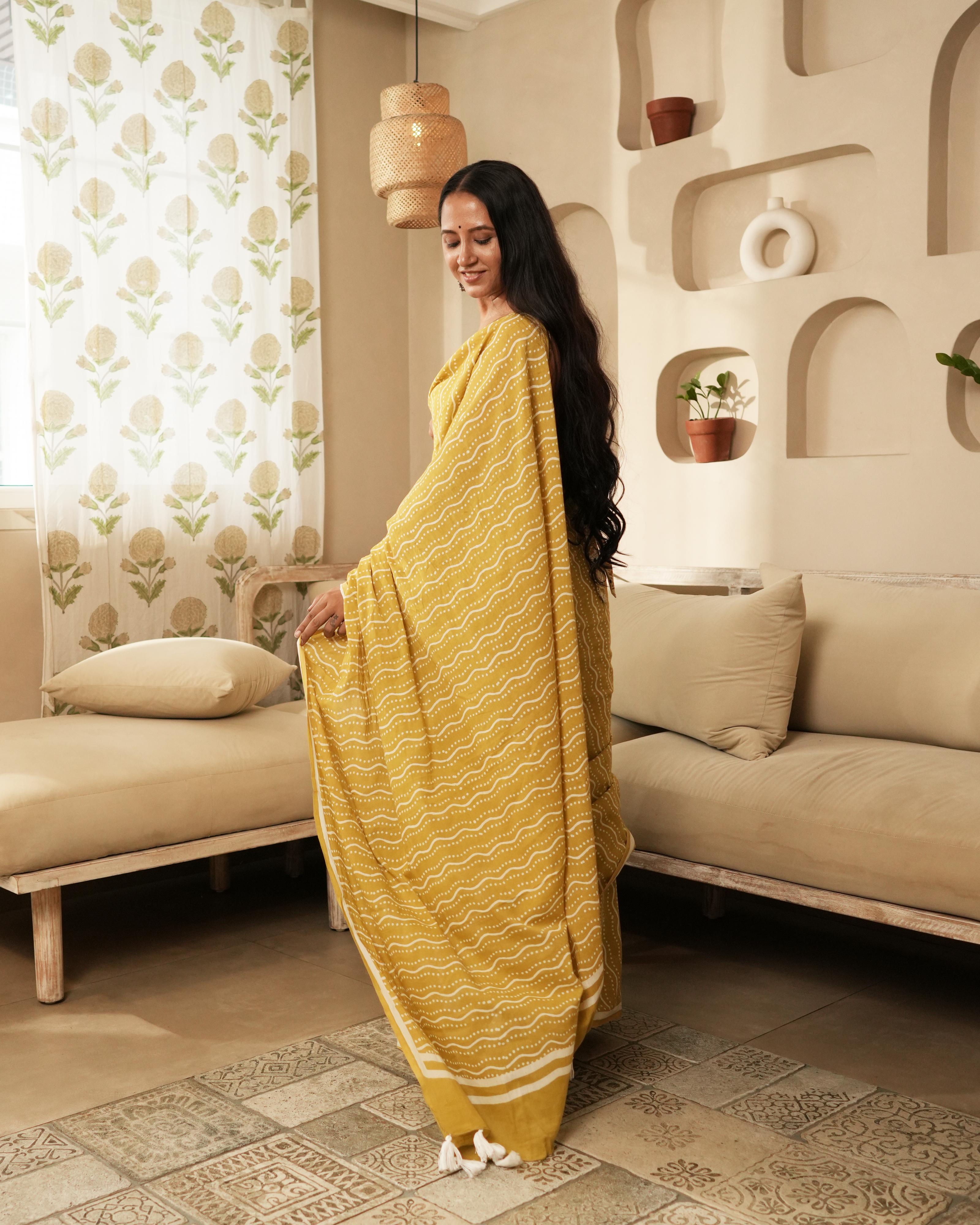 Yellow Waves Hand Block Printed Mul Saree with Tassels